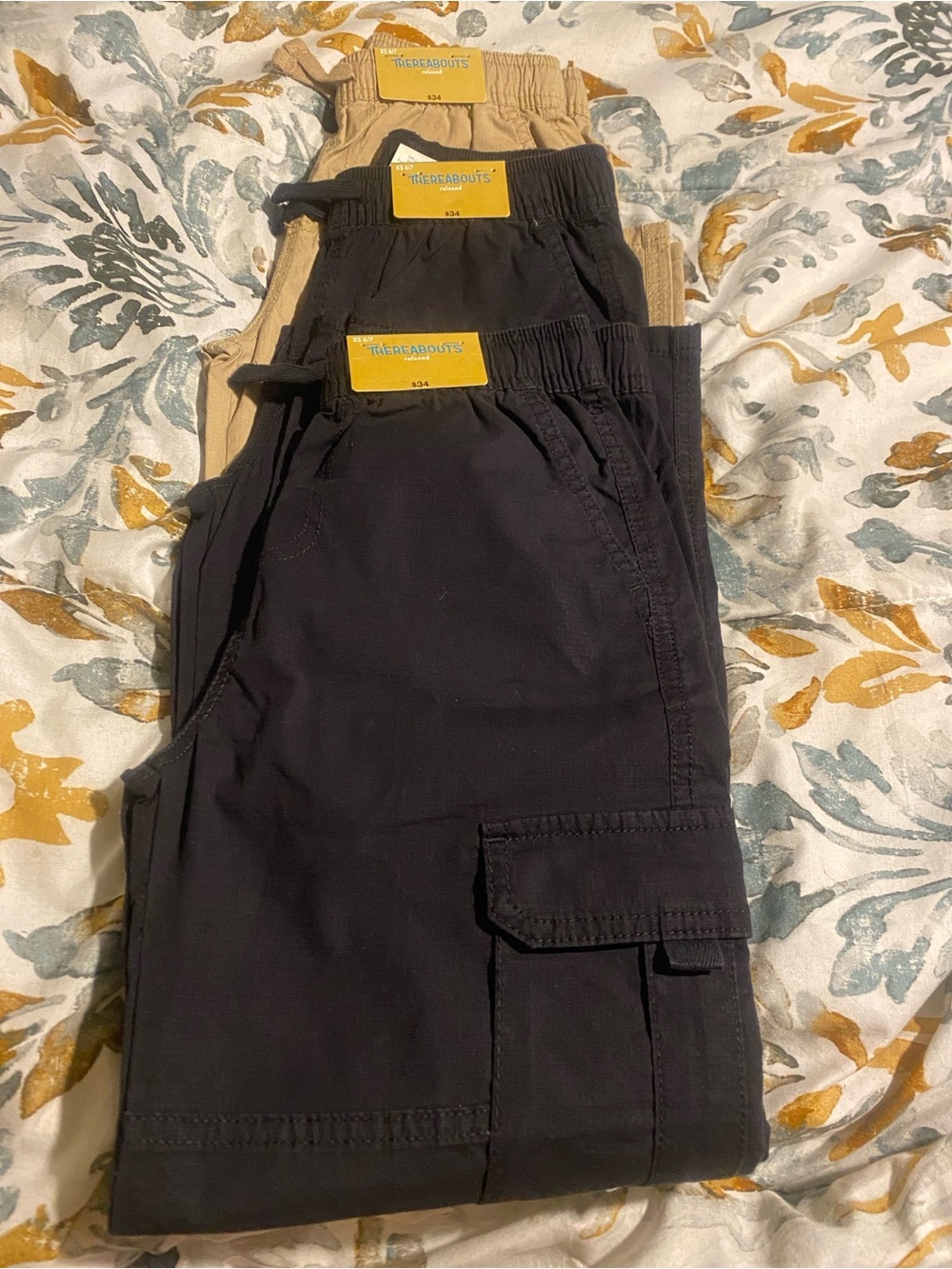 Bundle of 3 pairs of boys’ Thereabouts cargo pants in size 6/7